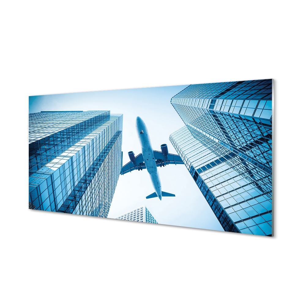 Obraz na szkle Przeszklone wieżowce widok na samolot