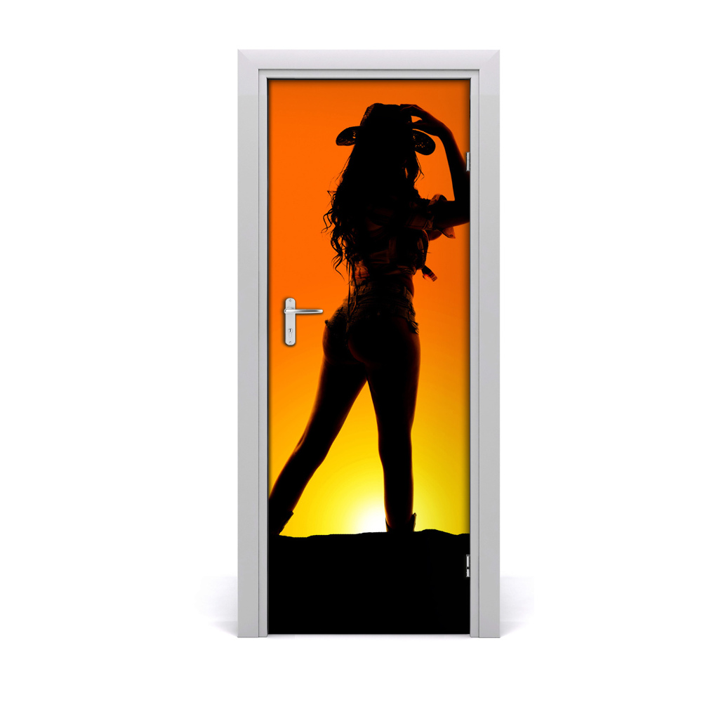 Naklejka fototapeta na drzwi Kowbojka na pomarańczowym tle