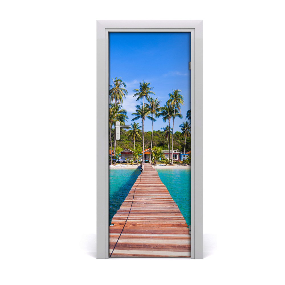 Fototapeta samoprzylepna drzwi Tropikalny drewniany pomost na plaże
