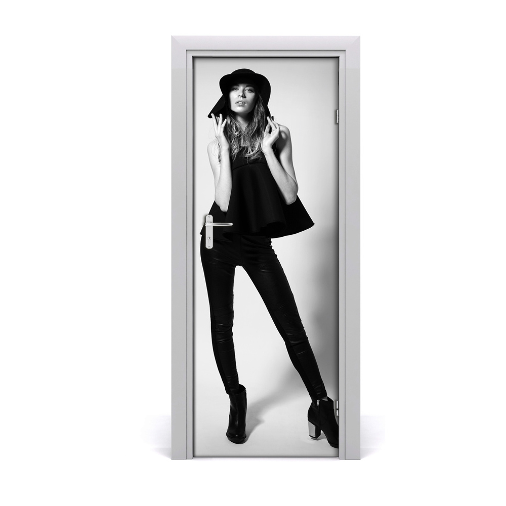 Naklejka fototapeta na drzwi Kobieta w czarnym kapeluszu