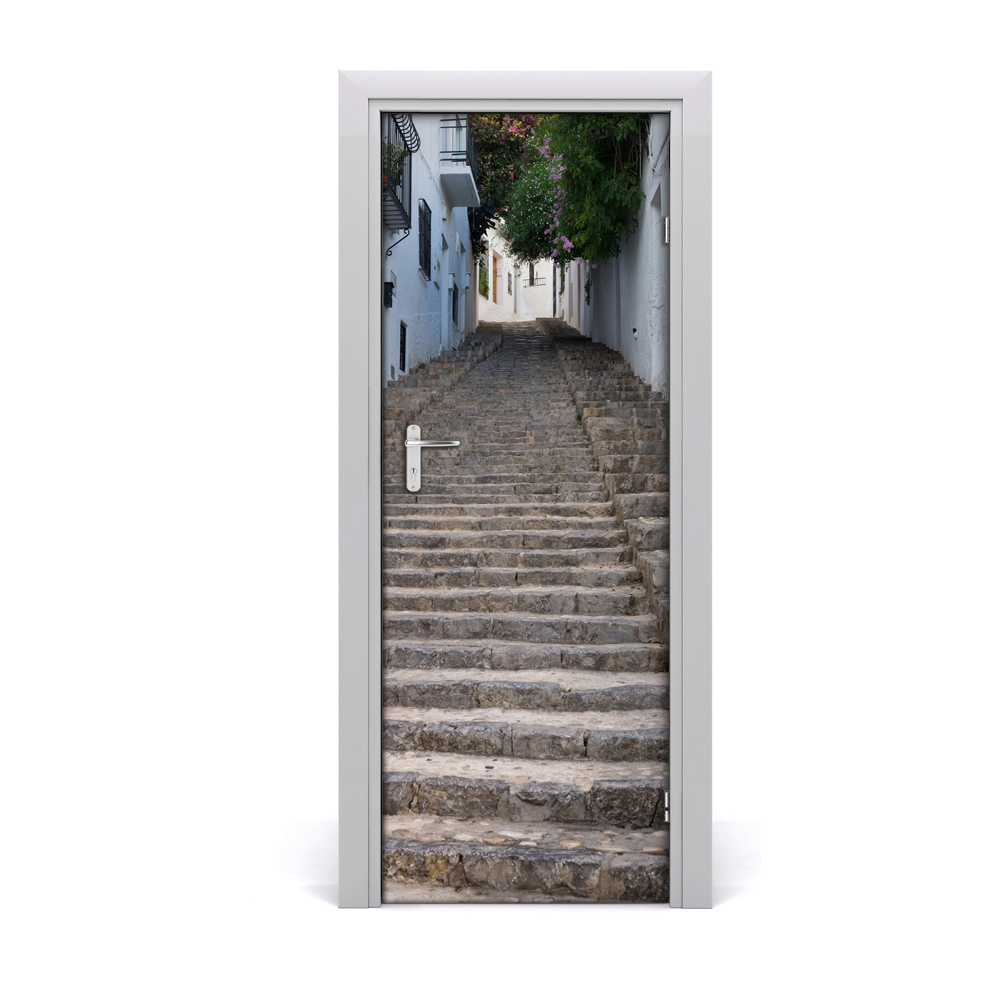 Fototapeta samoprzylepna na drzwi Kamienne schody białe budynki
