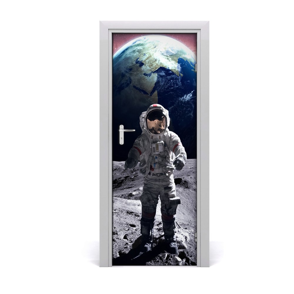 Fototapeta samoprzylepna na drzwi Astronauta na tle ziemi