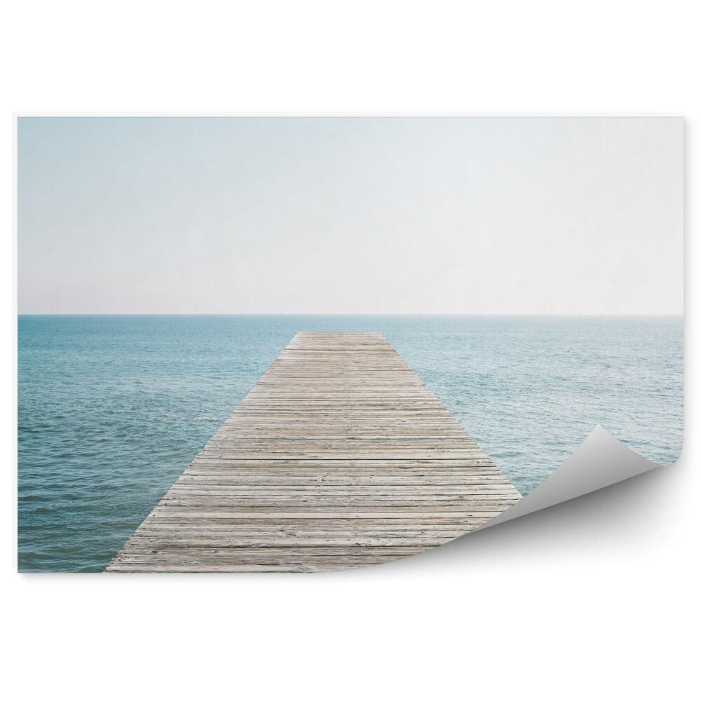 Fototapeta samoprzylepna Drewniany pomost woda błękit horyzont