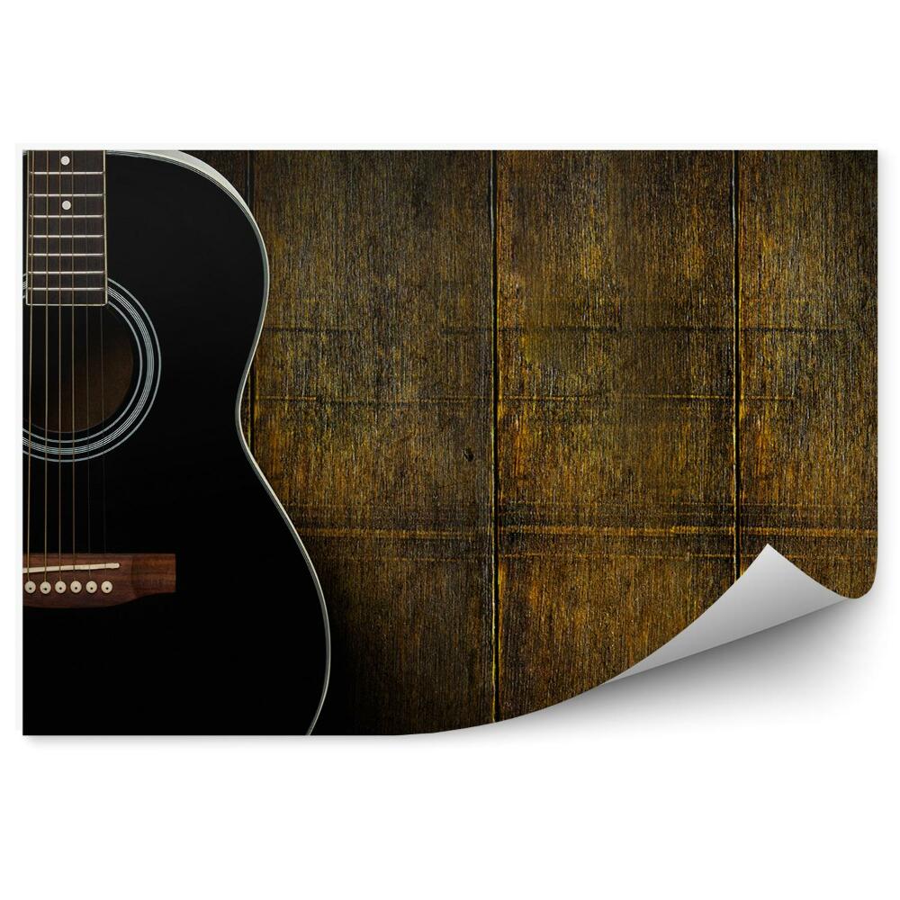 Fototapeta Czarna gitara akustyczna ciemne drewniane tło