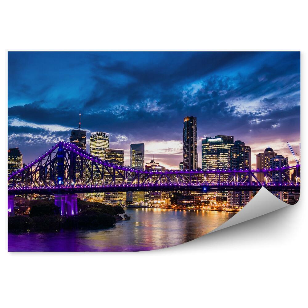 Fototapeta Panorama miasta wieżowce rzeka most światła noc chmury