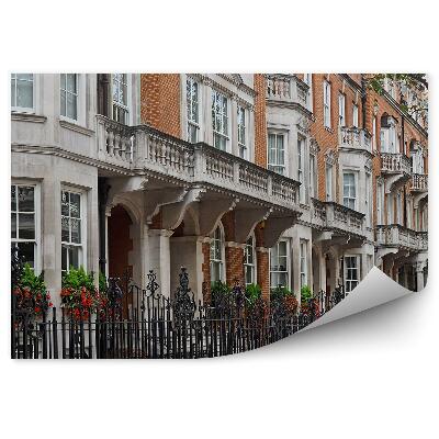 Fototapeta samoprzylepna Kamienica rząd odgrodzonych budynków