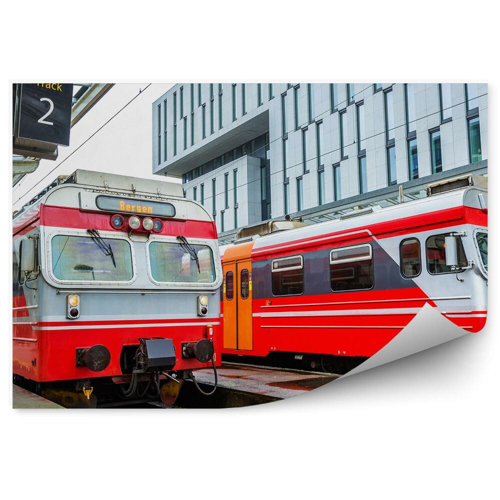 Okleina na ścianę Czerwone pociągi w mieście peron podróżni