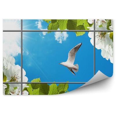 Fototapeta na ścianę Biały ptak kwitnące drzewo błękitne niebo