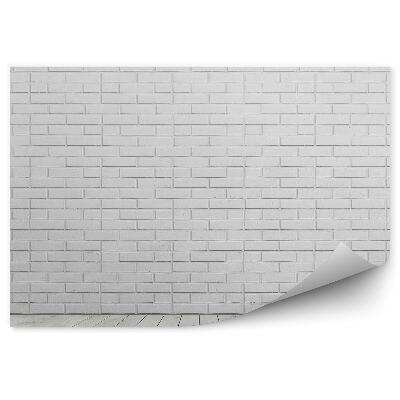 Fototapeta samoprzylepna Ceglana biała ściana i drewniana podłoga