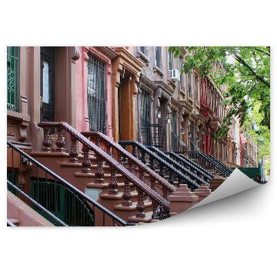 Fototapeta budynki Harlem Nowy Jork drzewa ludzie samochody schody znak