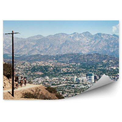 Fototapeta konie góry wieżowce trawa niebo chmury Kalifornia Los Angeles