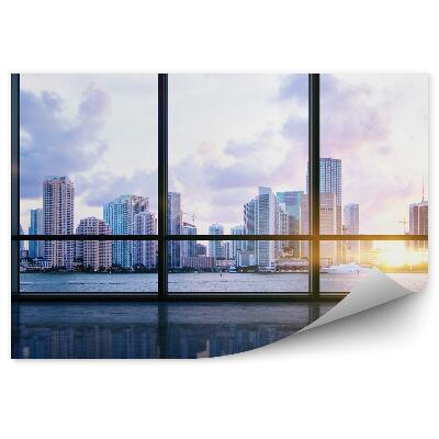 Fototapeta na ścianę Blask słońca pomiędzy budynkami miasto rzeka