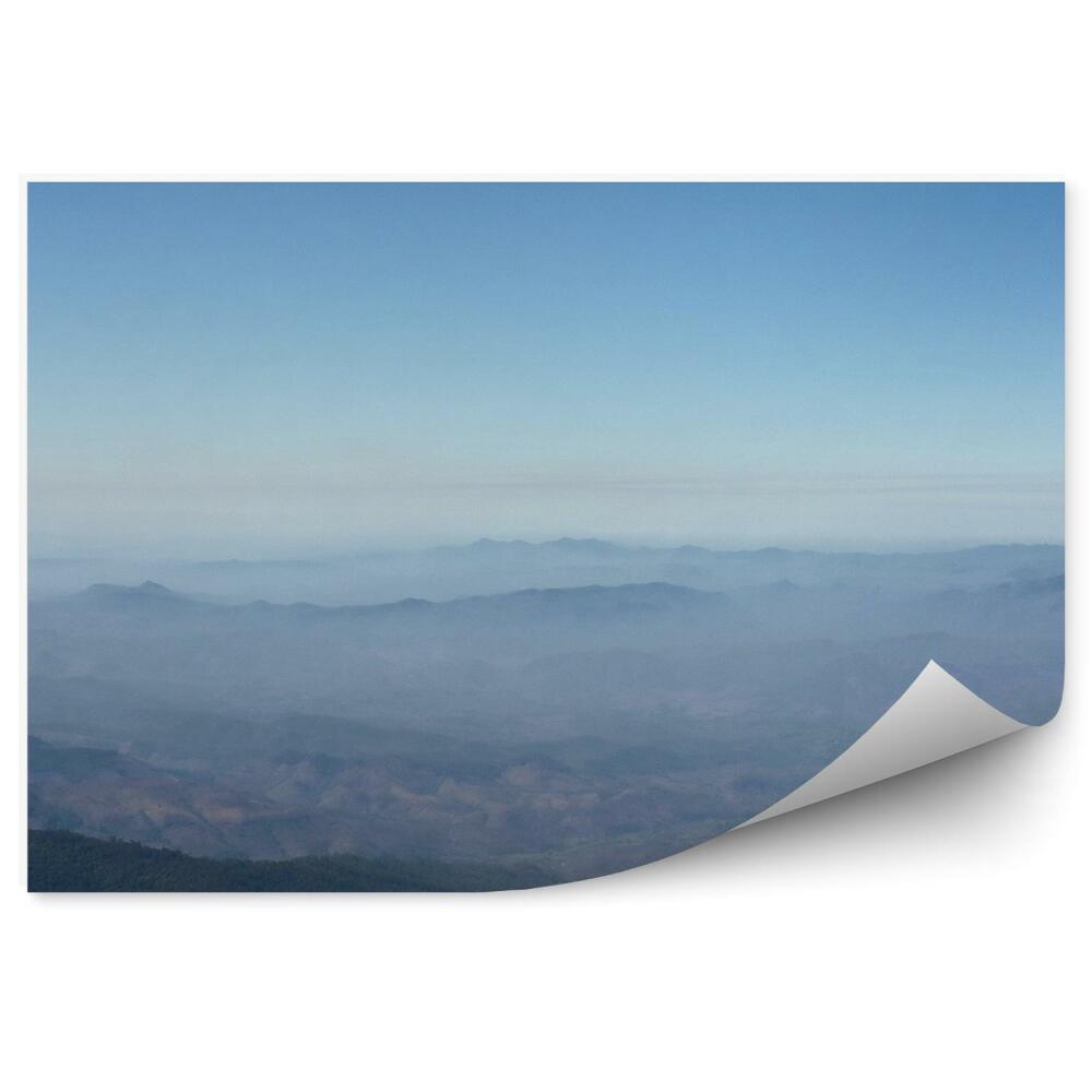 Okleina ścienna Panoramiczny widok szczyt góry budynki poranna mgła niebo