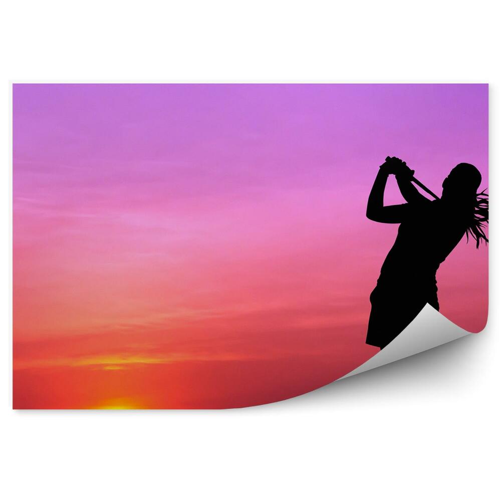 Fototapeta samoprzylepna Golfista trawa zachód słońca cień