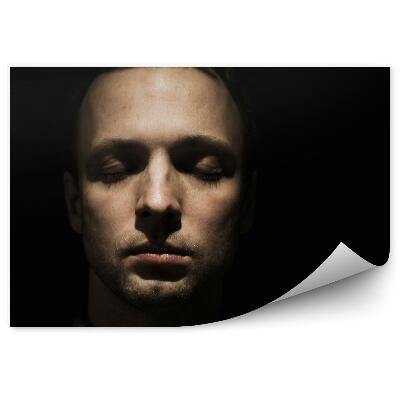 Fotopeta Portret młodego mężczyzny zarost ciemne tło