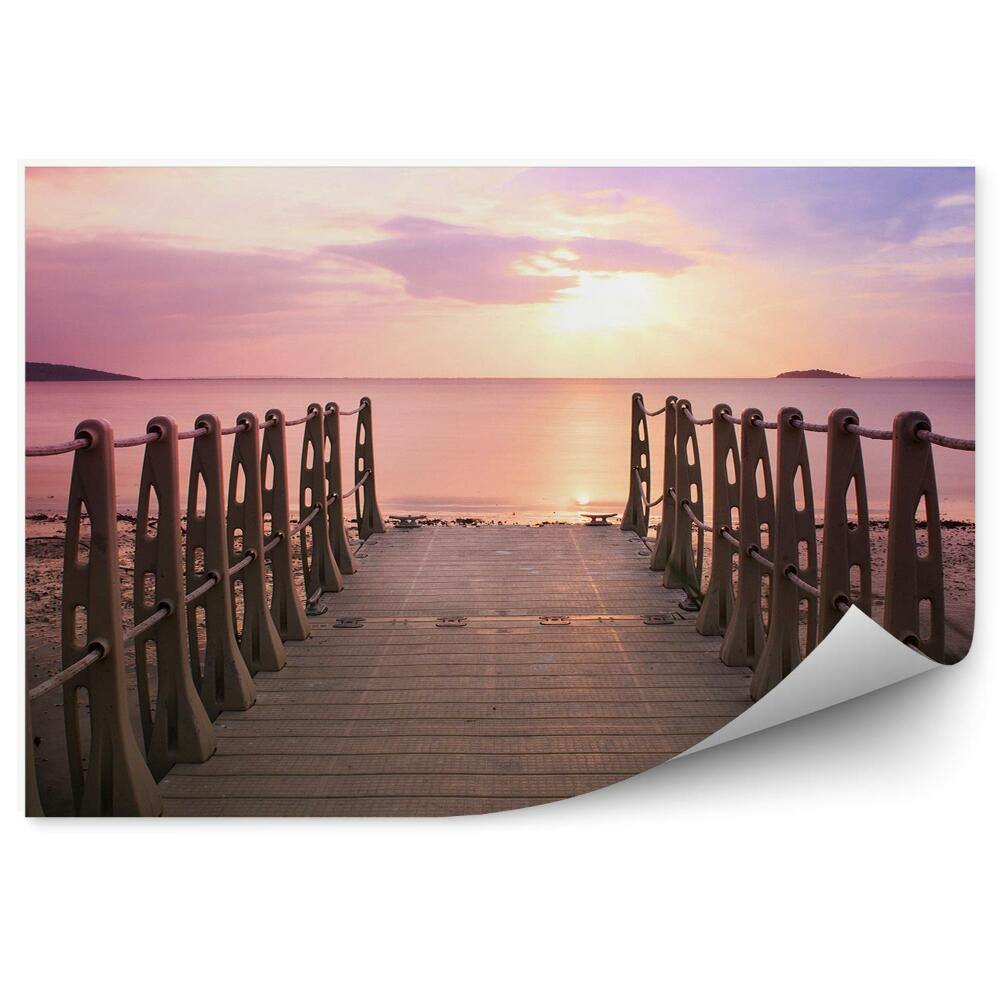 Okleina na ścianę Różowe światło słońce nad horyzontem plaża molo