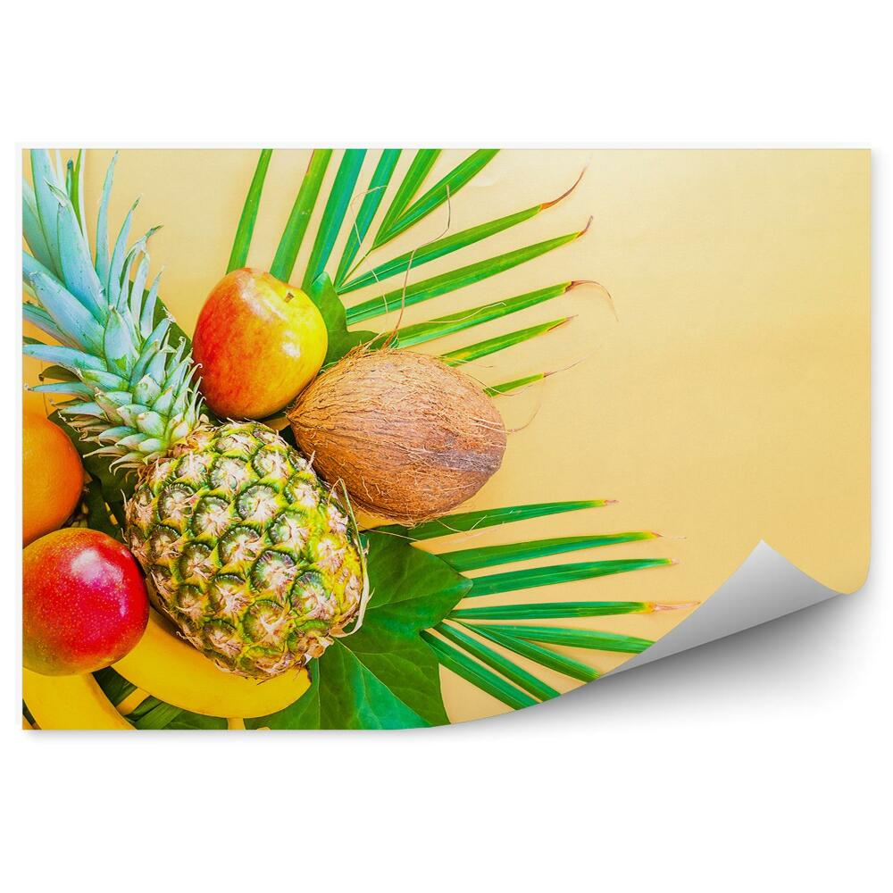 Fototapeta Tropikalne owoce kokos ananas liście żółte tło
