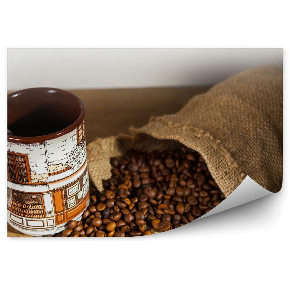 Fototapeta Ziarna kawy płócienna torba kubek drewniany stół