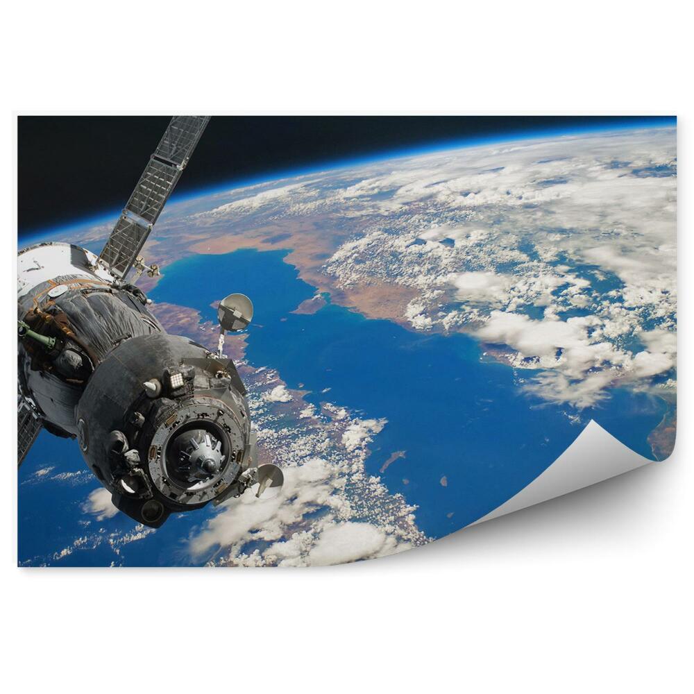Fototapeta Statek kosmiczny astronauta orbita ocean kontynenty