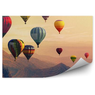 Fototapeta Gorące powietrze balony wysokie góry zachód słońca drzewa