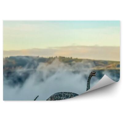 Fototapeta Figurka brontozaura na tle wzgórz