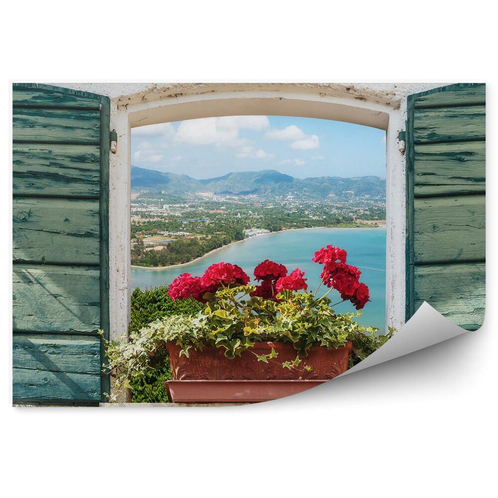 Okleina na ścianę Kwiaty w oknie widok na wyspę wodę