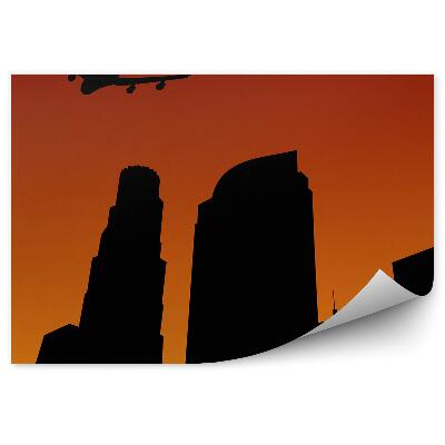 Okleina na ścianę Samolot przelatujący ponad miastem kształty