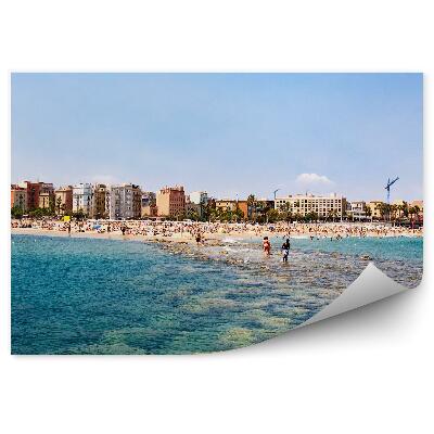 Okleina ścienna plaża kamienie ludzie budynki niebo Barcelona