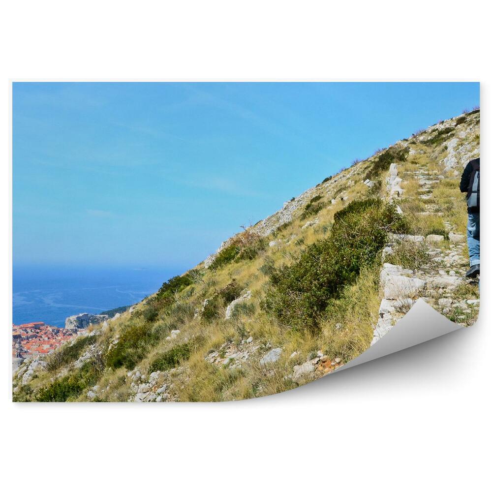 Okleina na ścianę skały trawa człowiek twierdza Dubrownik Chorwacja morze