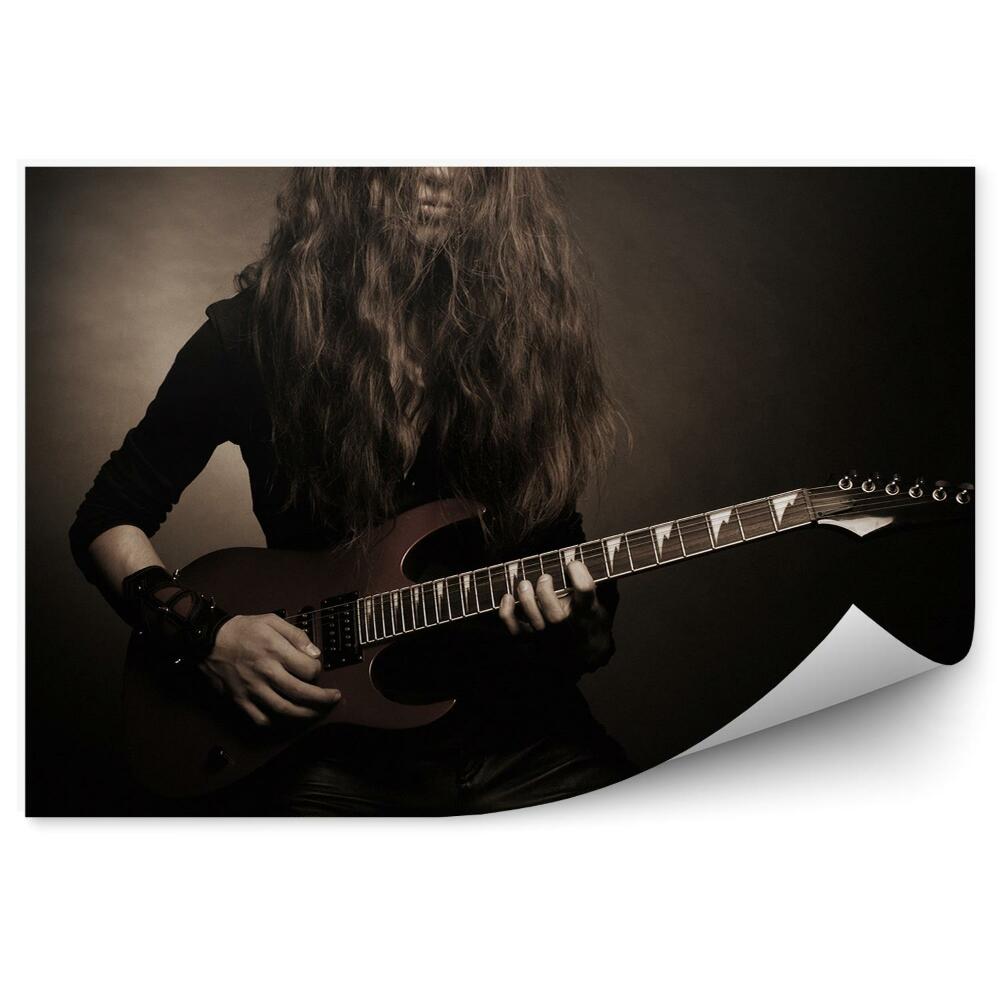 Fototapeta Młody gitarzysta długie włosy gitara