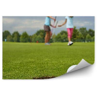 Fototapeta samoprzylepna Dołek piłka golfowa dzieci wózek niebo chmury drzewa