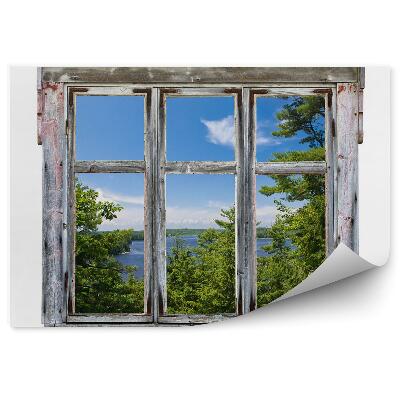 Fototapeta Malowniczy widok widziany przez ramy okna starego