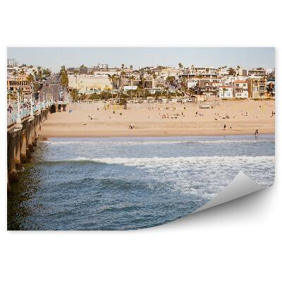 Fototapeta samoprzylepna Manhattan morze fale plaża betonowe molo