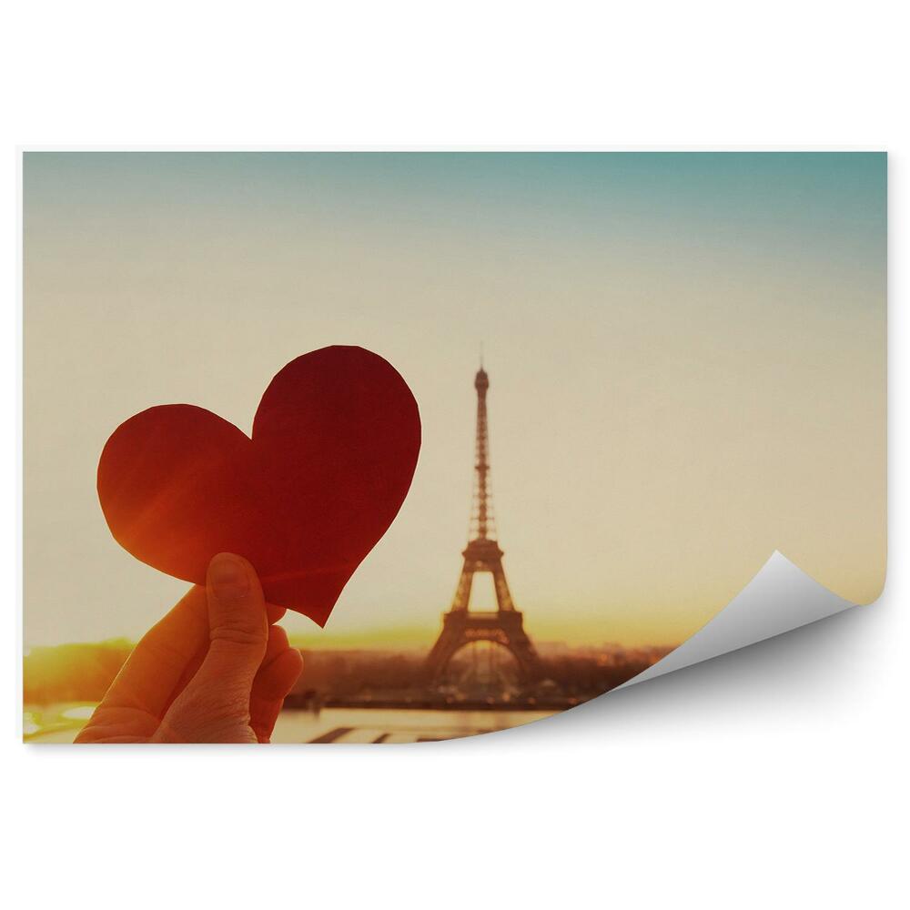Fototapeta samoprzylepna Miłość serce wycięte z papieru na tle wieży eiffla