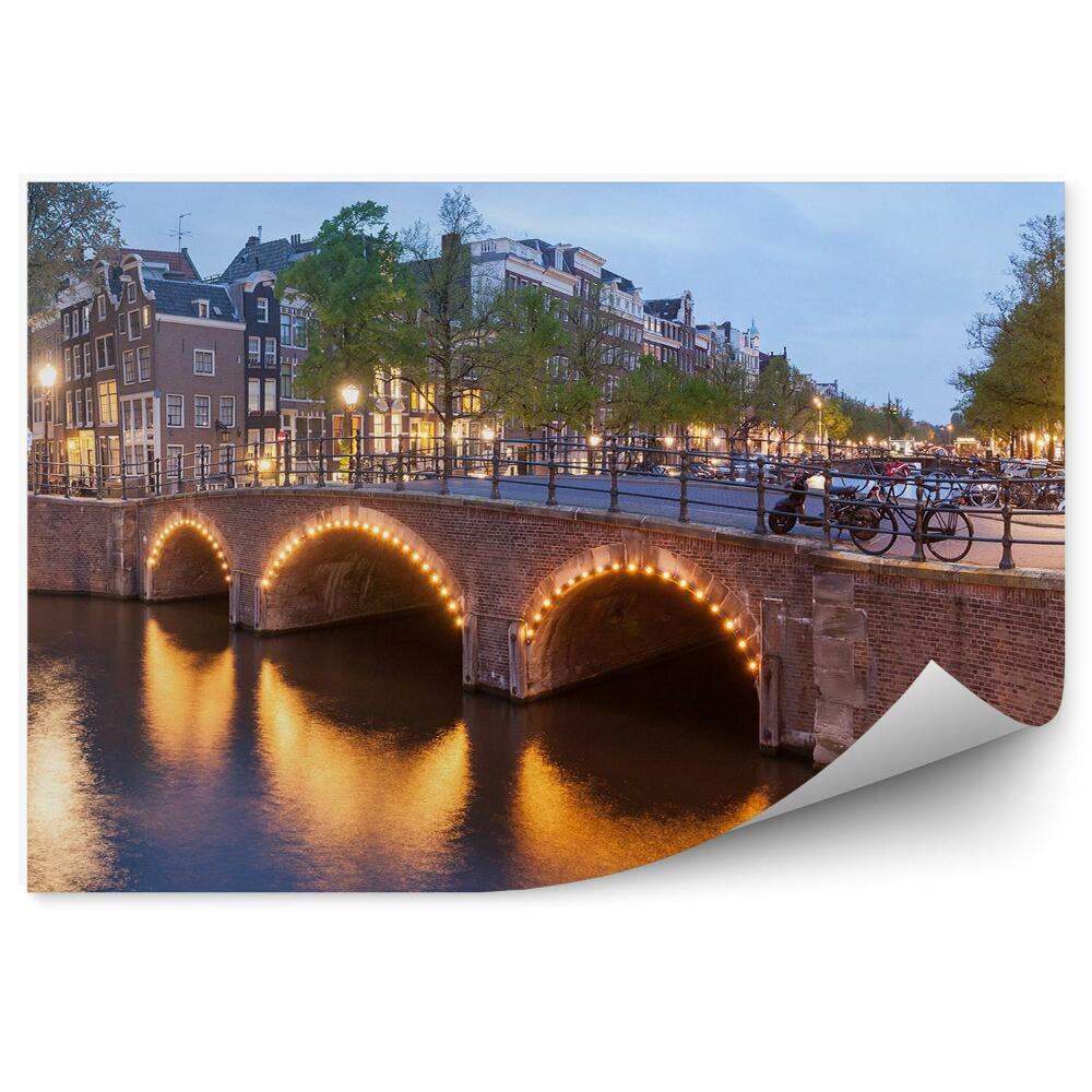 Fototapeta Panorama piękne kanały amsterdam budynki drzewa rowery motory drzewa lampy rzeka światła