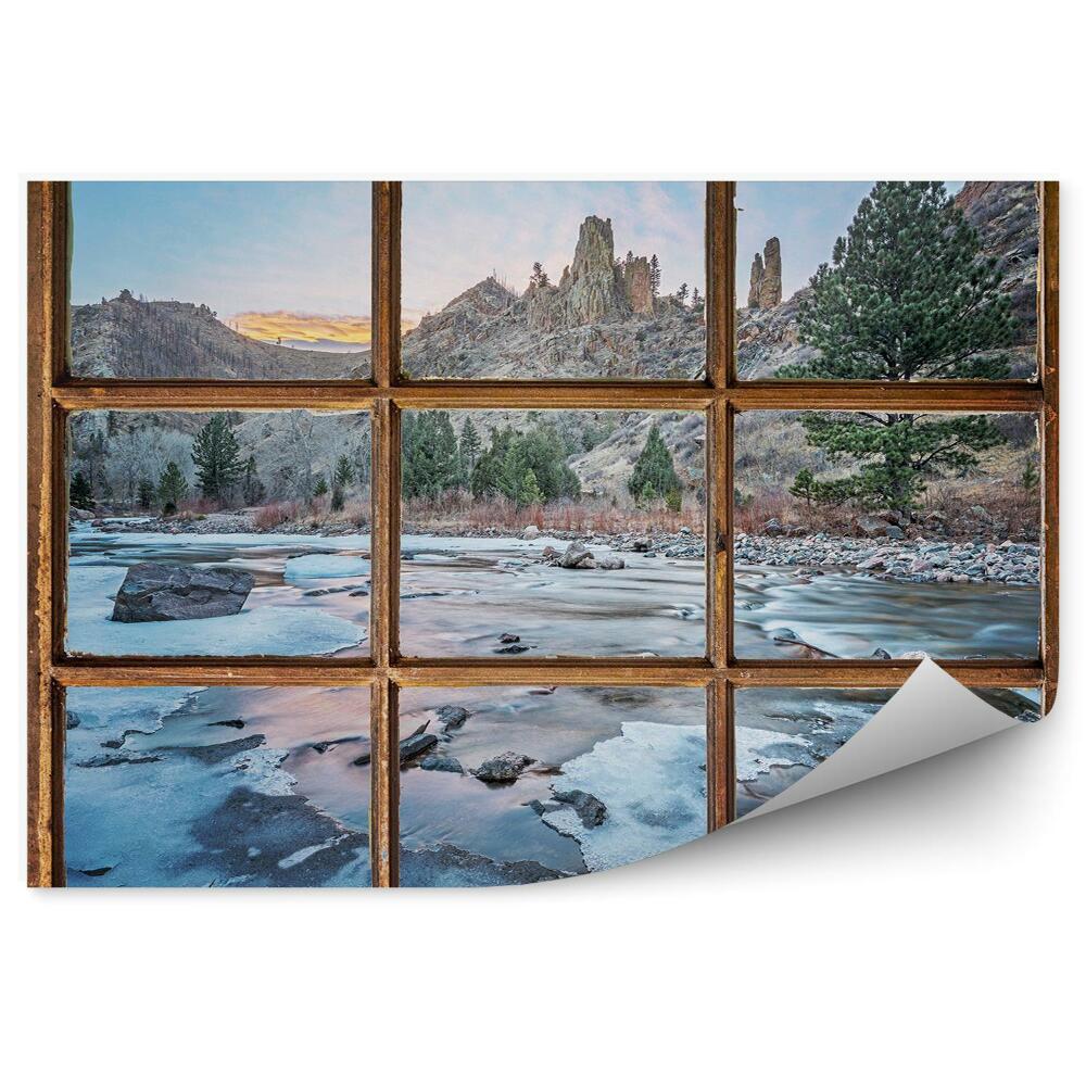 Fototapeta na ścianę Stare okno z widokiem na góry i zamarznięty potok