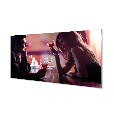 Obraz na szkle Para przy stoliku kieliszki