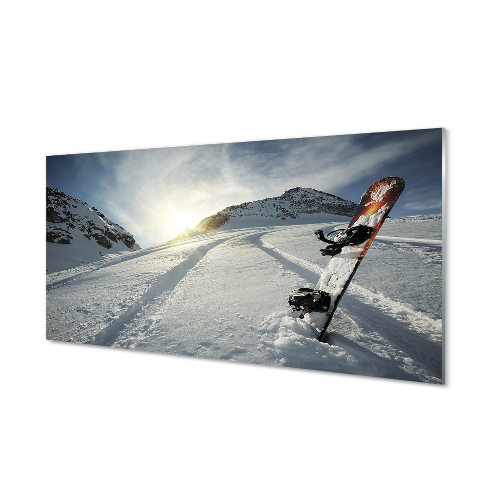 Obraz na szkle Deska snowboardowa w śniegu góry