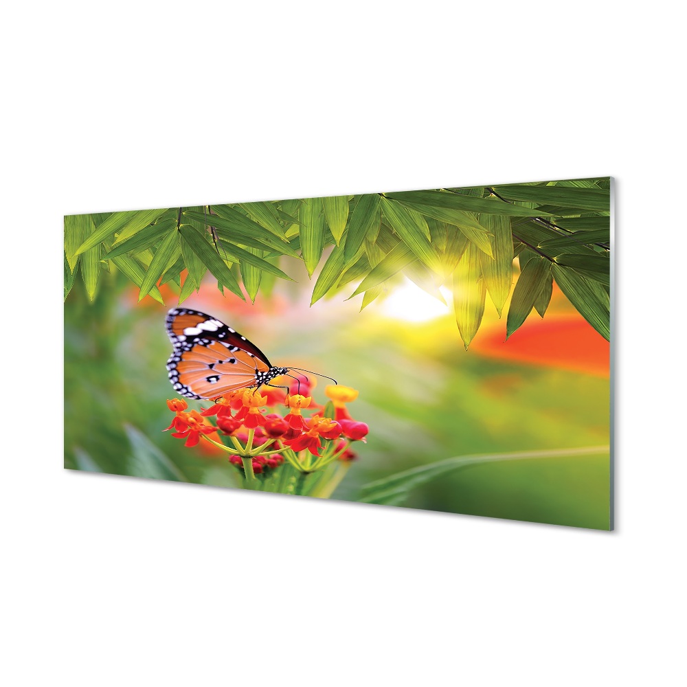 Obraz na szkle Pomarańczowy motyl na kwiatkach