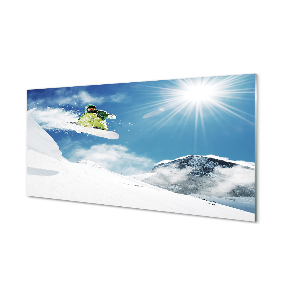 Obraz na szkle Snowboardzista na tle gór i słońca