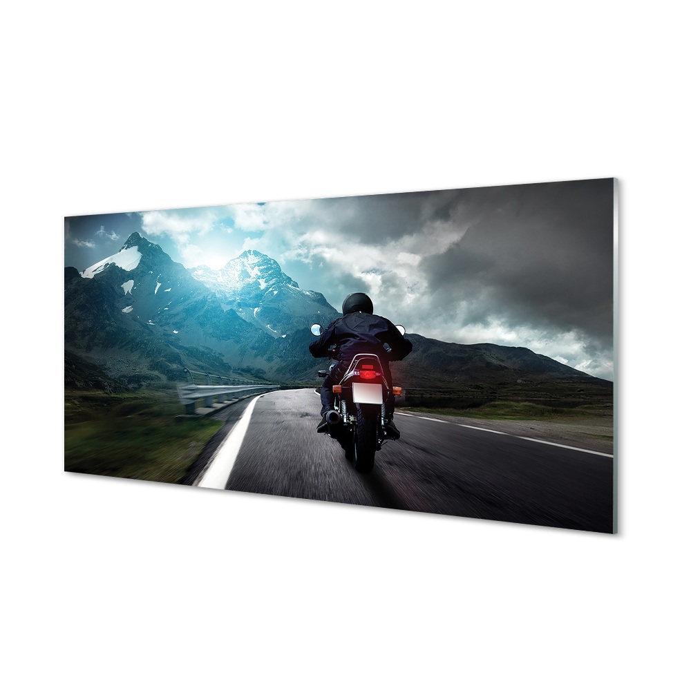 Obraz na szkle Motocykl droga w górach chmury
