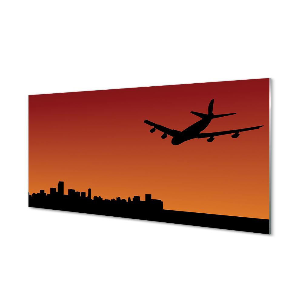 Obraz na szkle Pomarańczowe tło samolot miasto