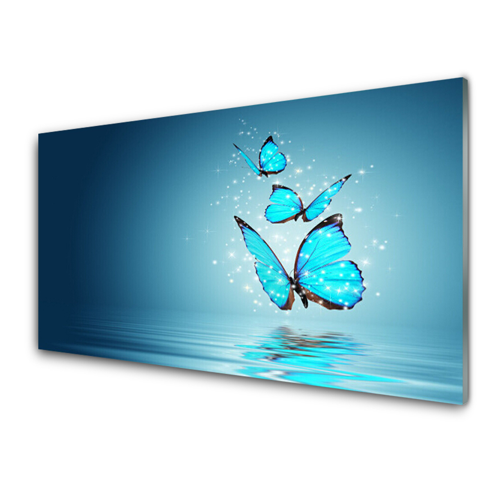 Obraz Szklany Niebieskie Motyle nad wodą