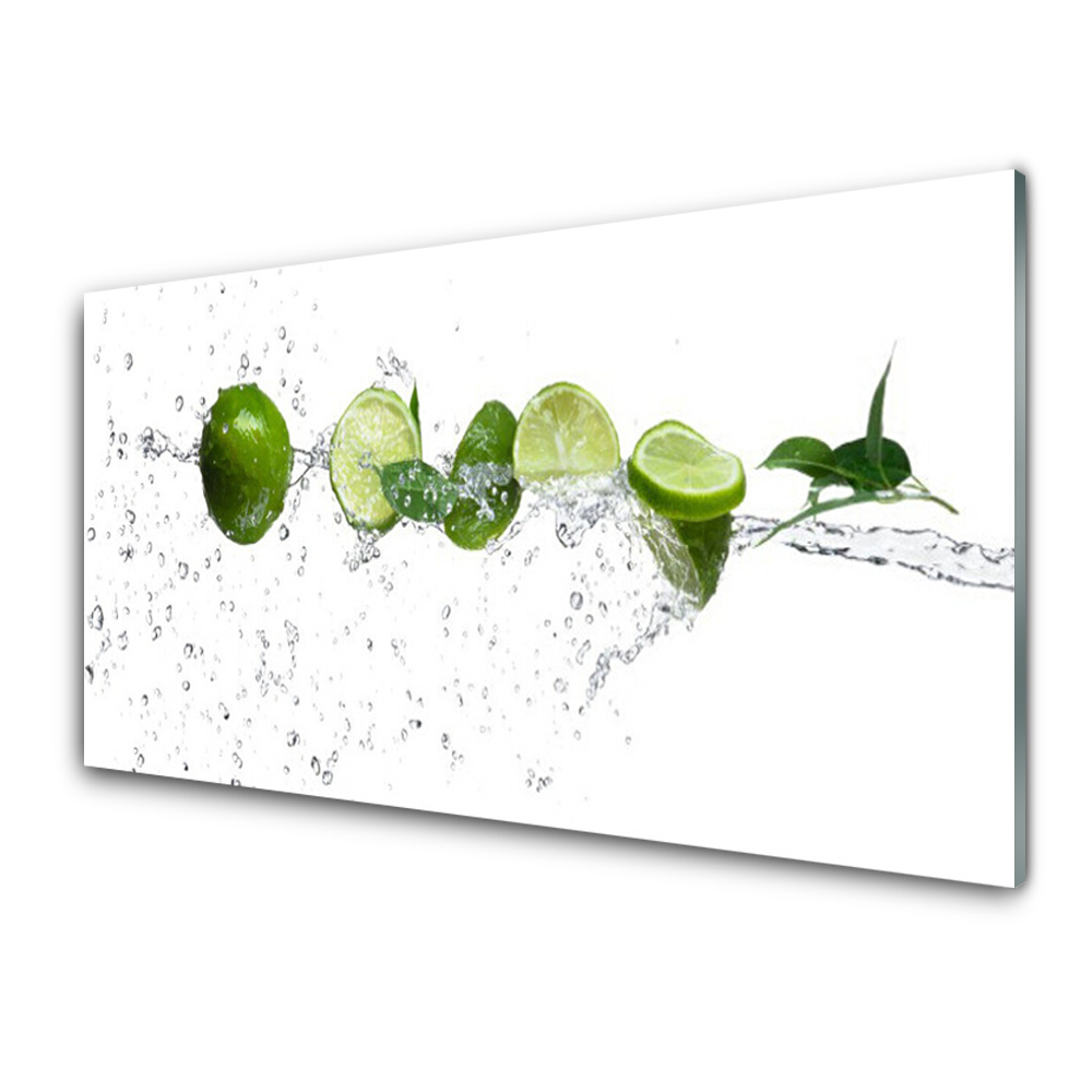 Obraz Szklany Połówki limonki w wodzie tło