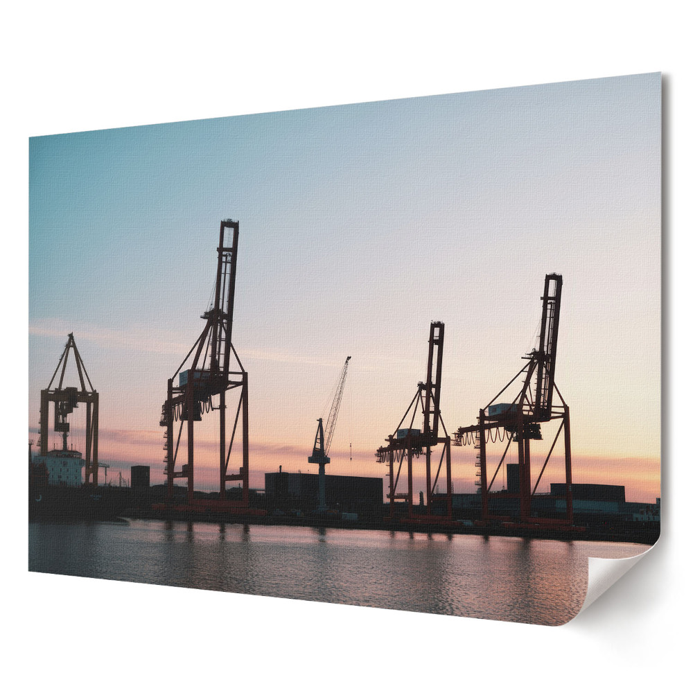 Plakat ścienny premium Portowe dźwigi o zachodzie słońca