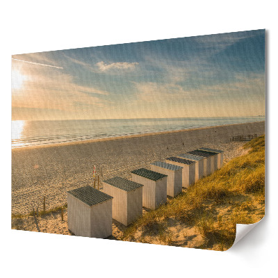 Plakat ścienny premium Spokojny poranek na plaży z domkami